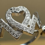 Intertwined Heart CZ Silver Ring - Image 3